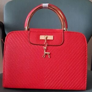 Elegant Red Handbag with Gold Accents